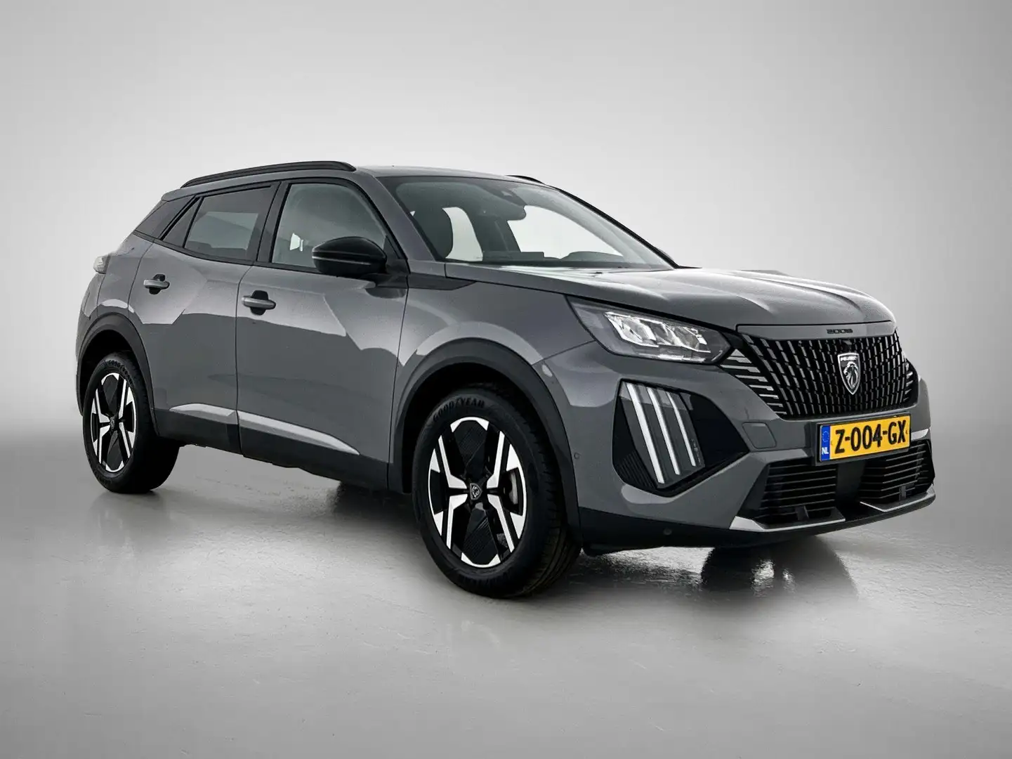 Peugeot 2008 1.2 PureTech 100 Allure Navigatie | Camera voor + Grijs - 2