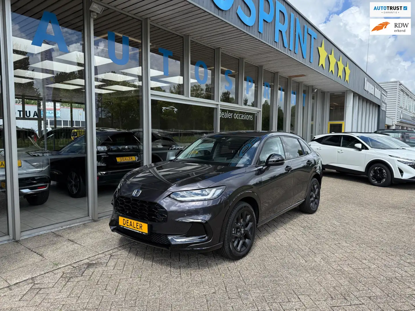 Honda ZR-V 2.0 e:HEV Sport 184PK / APPLE CARPIAY / ACHTERUITR Grijs - 1