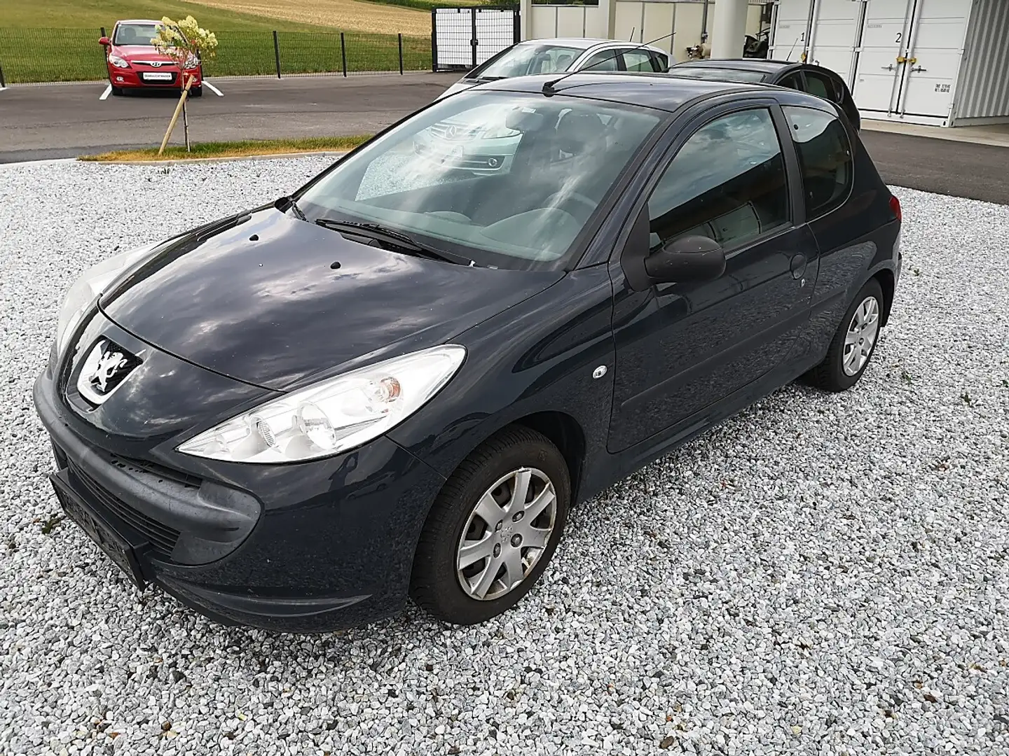 Peugeot 206 + Junior 1,1 Grau - 1
