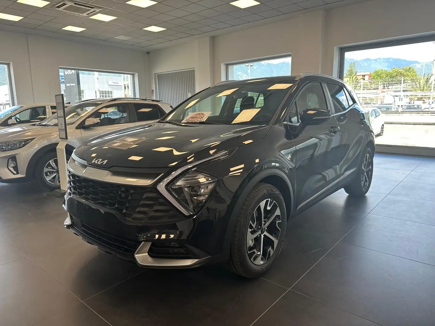 Kia Sportage 1.6 T-GDi HEV AT6 Style  KM ZERO Zwart - 1