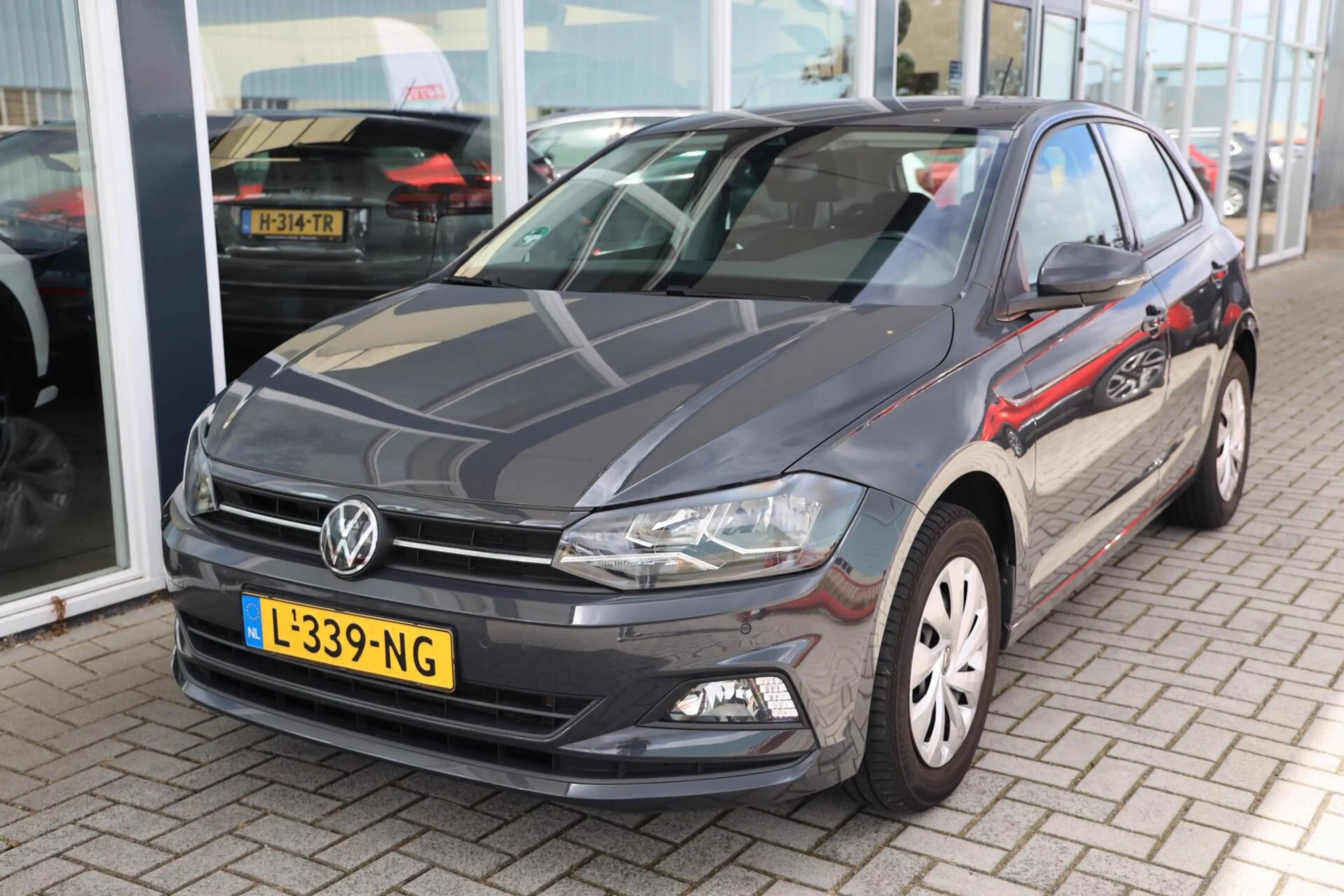 Volkswagen Polo 1.0 TSI Comfortline Business| Carplay | Navigatie — photo 2