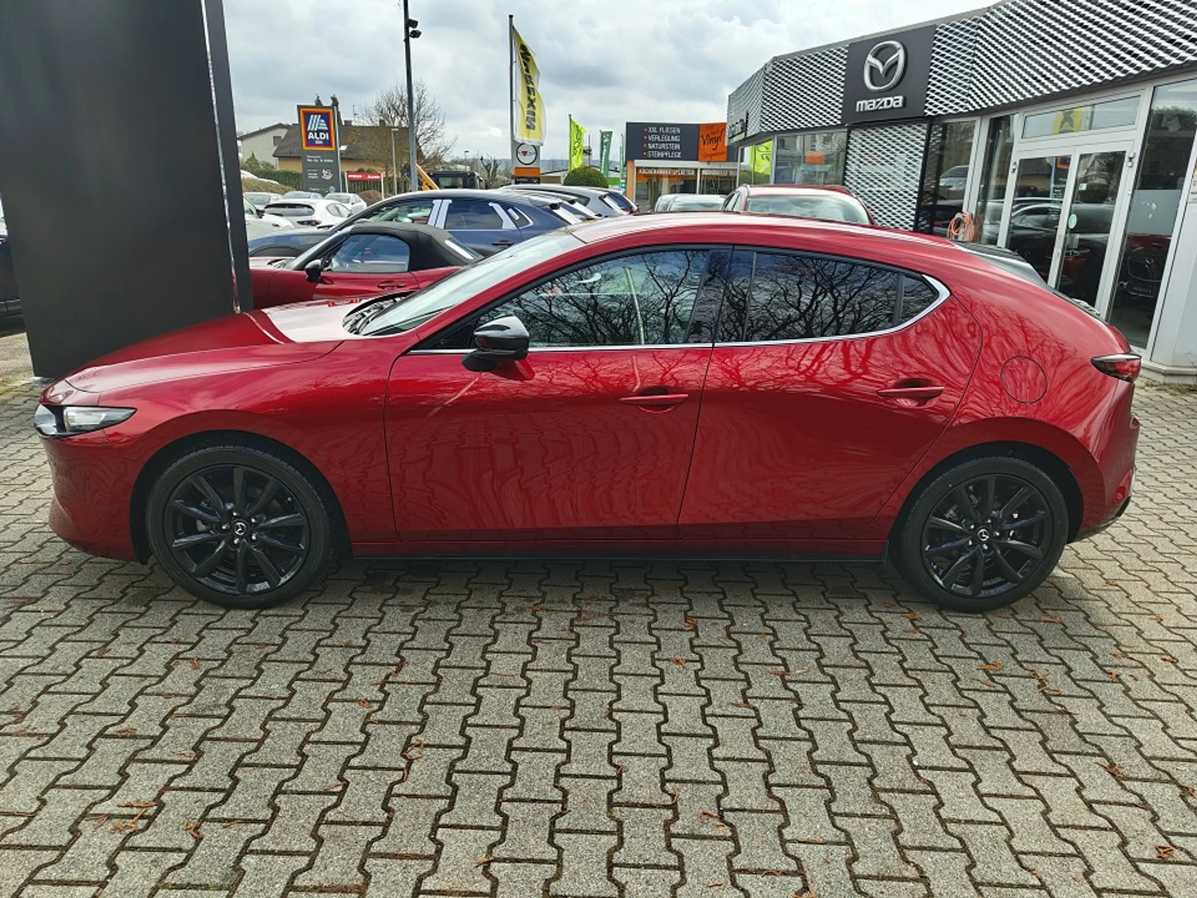 Mazda 3 2.5L e-SKYACTIV G FWD Homura — photo 2