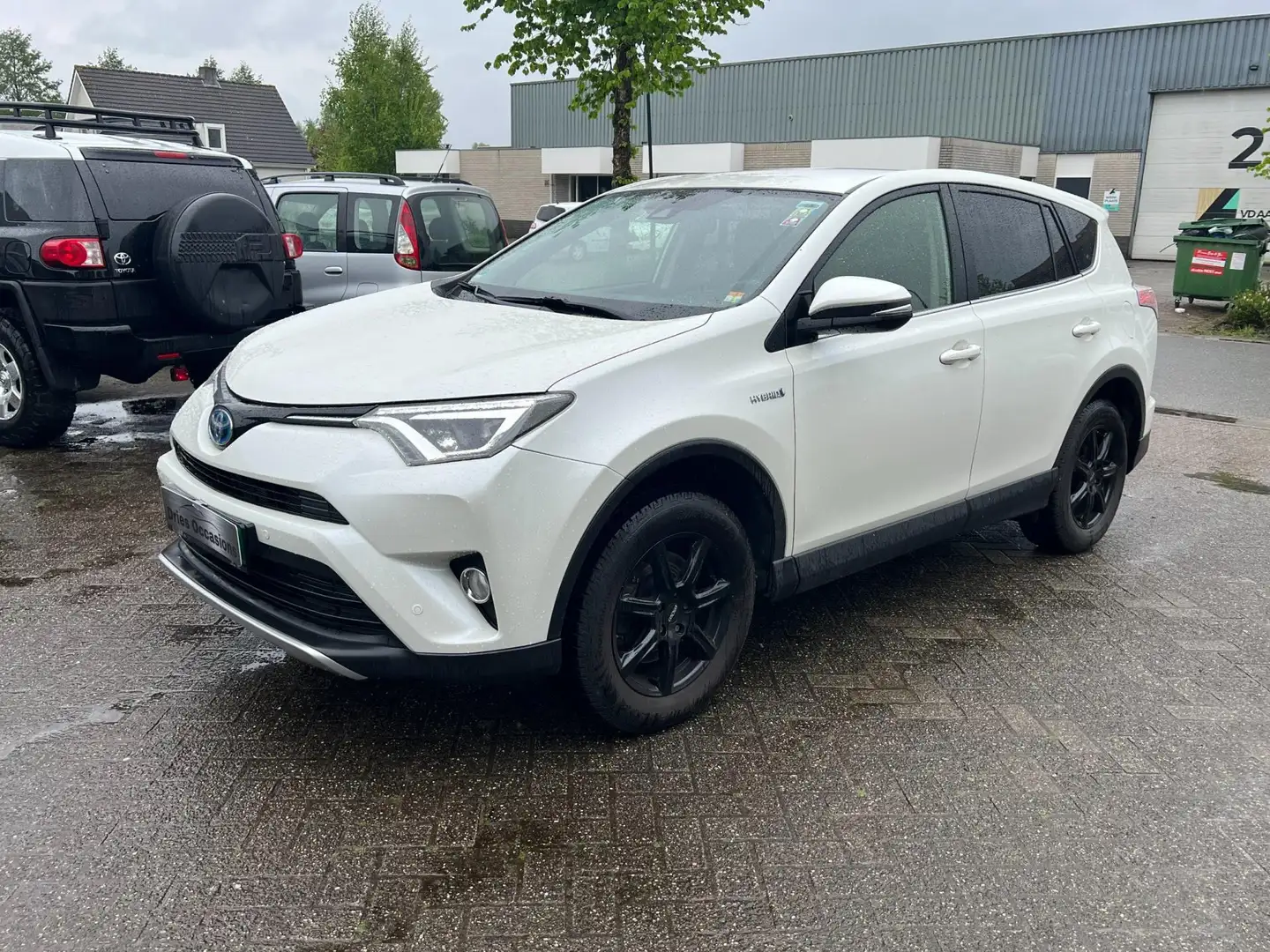 Toyota RAV 4 2.5 Hybrid AWD Executive Business standkachel trek Wit - 1