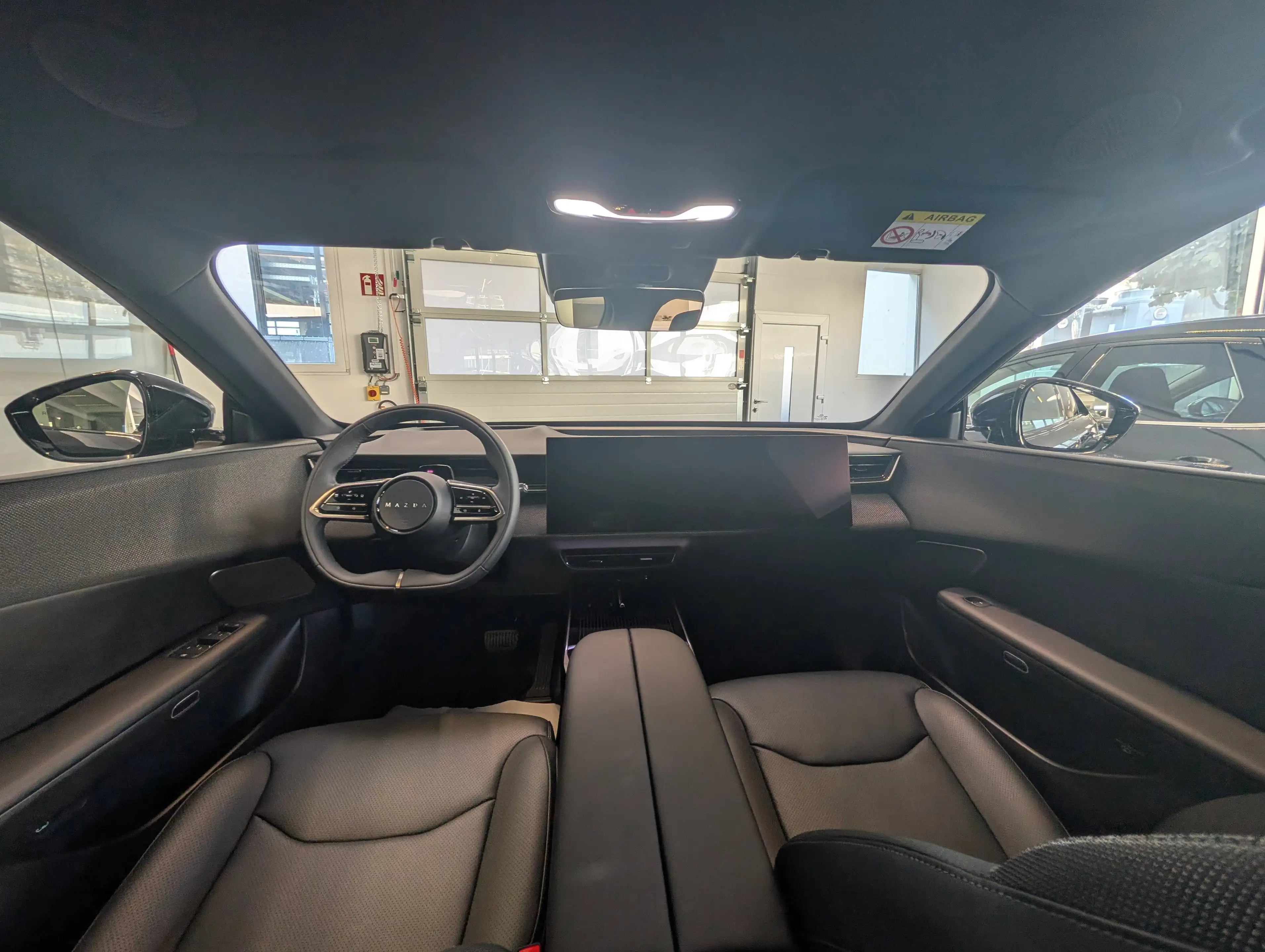 Mazda CX-6e Mazda CX-6e 78kWh Takumi Takumi — photo 6