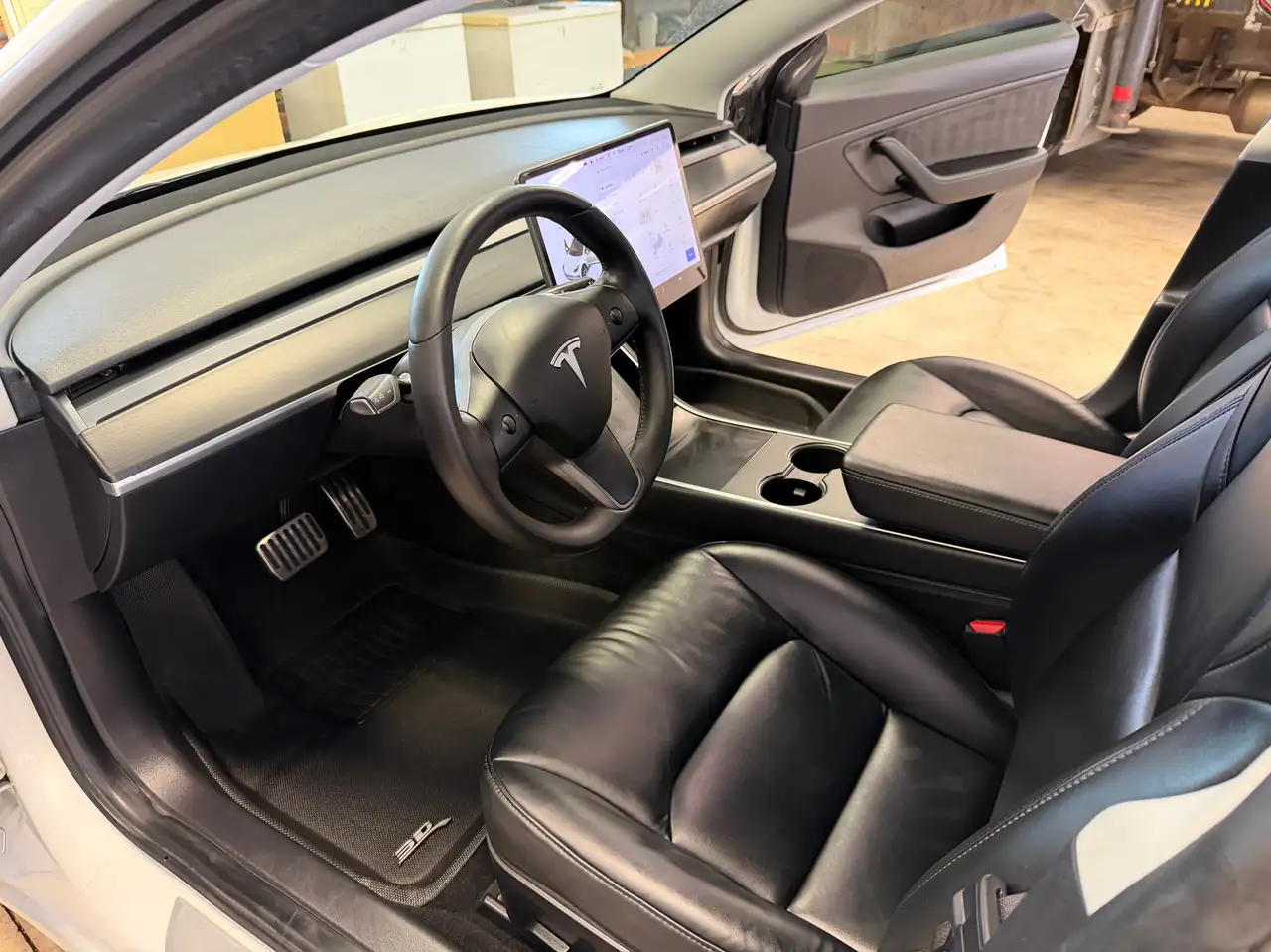 Tesla Model 3 photo Tesla Model 3