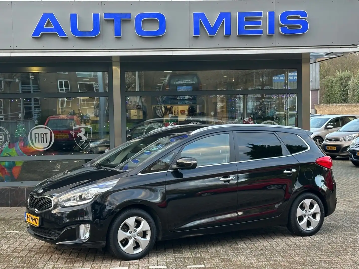 Kia Carens 2.0 GDI Business Pack Automaat 7P Navi Clima Cruis Schwarz - 1