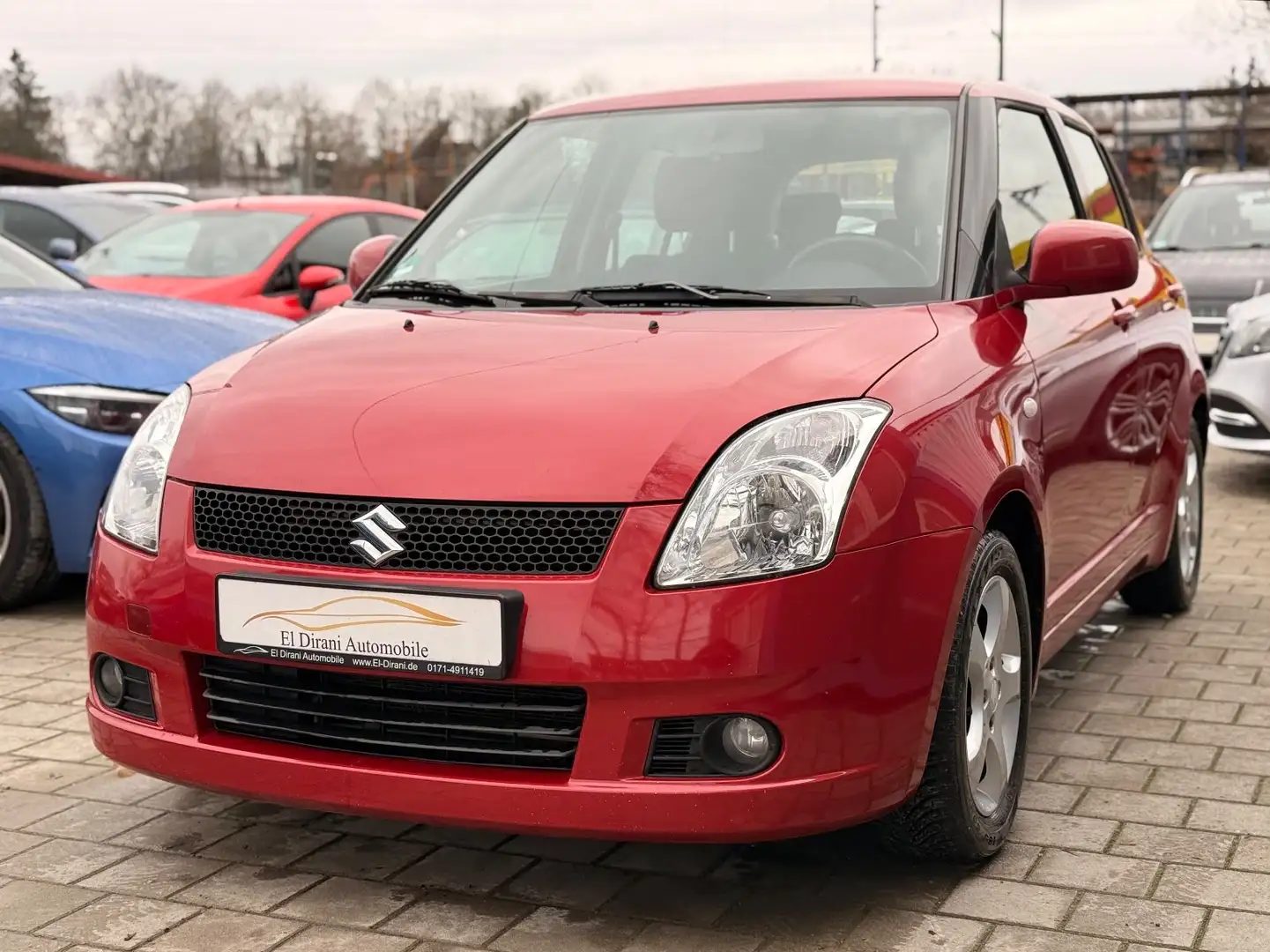 Suzuki Swift Lim. 1.3 16V 5-türig Klima/SHZ/TÜV 11.2026 Rood - 1