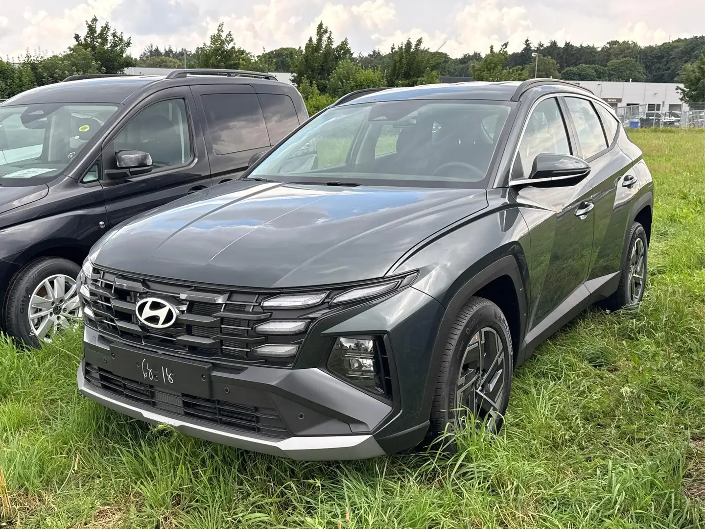 Hyundai TUCSON Style NAVI+KAMERA+SHZ+LED+TEMPOMAT+17" ALU+PDC ... Grün - 1