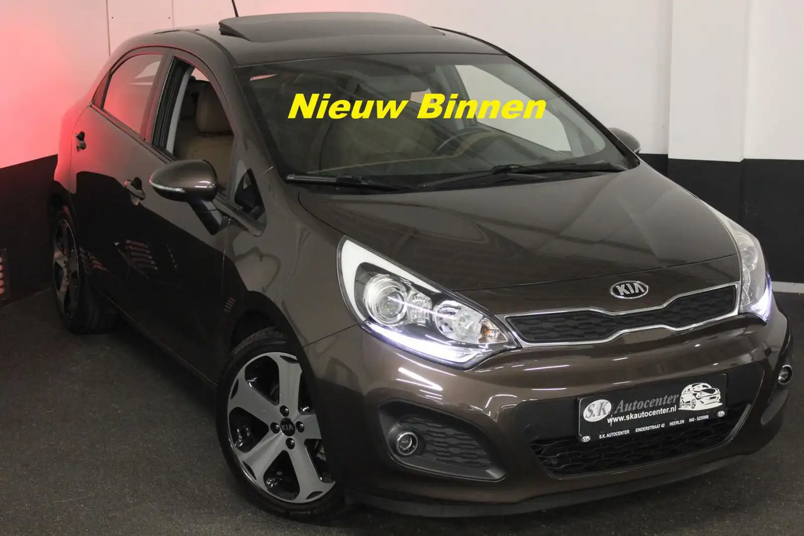 Kia Rio 1.4I PLATINUM*LEER*CAM*NAV*KEYLESS*PANO*FULL* Bruin - 1