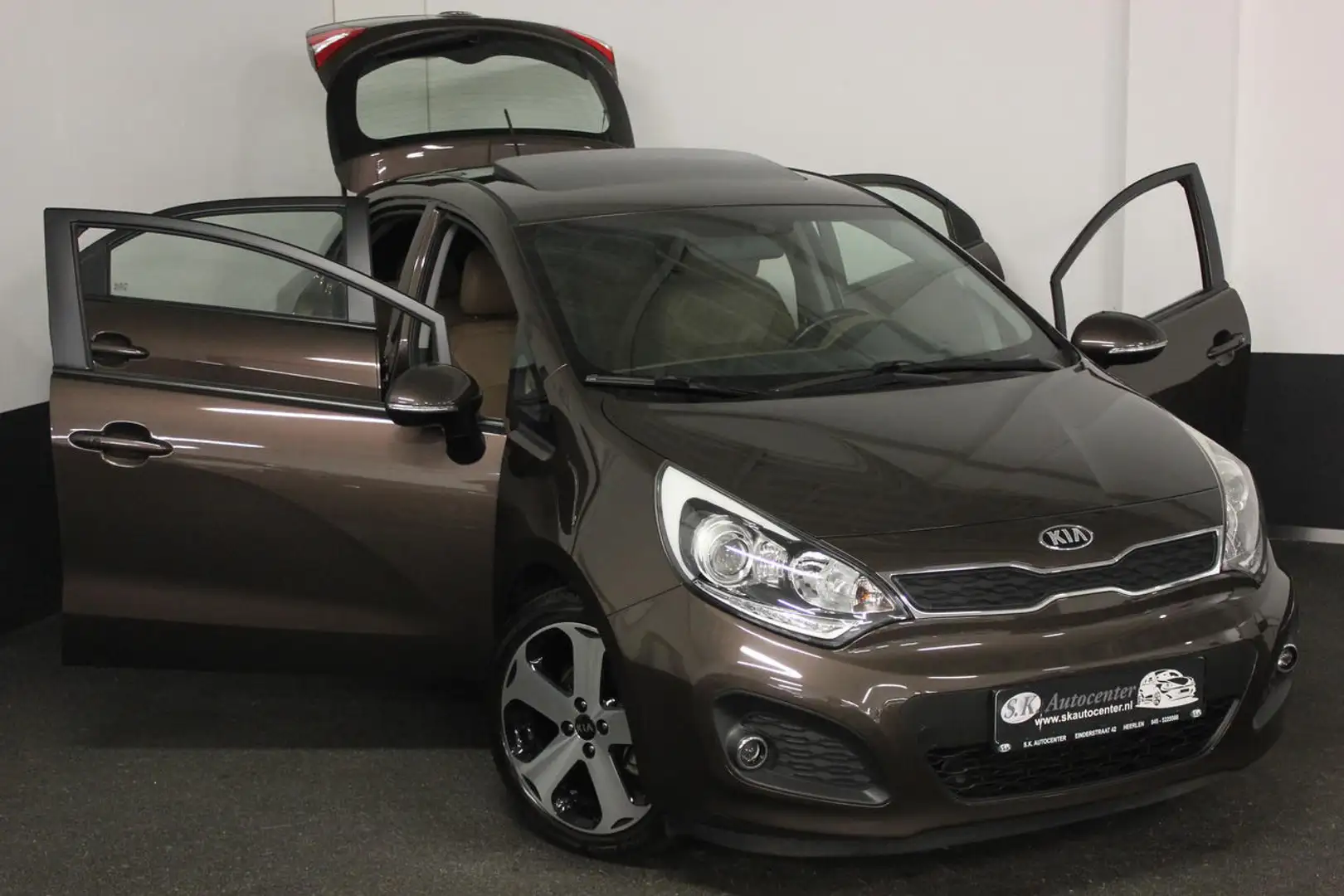 Kia Rio 1.4I PLATINUM*LEER*CAM*NAV*KEYLESS*PANO*FULL* Bruin - 2