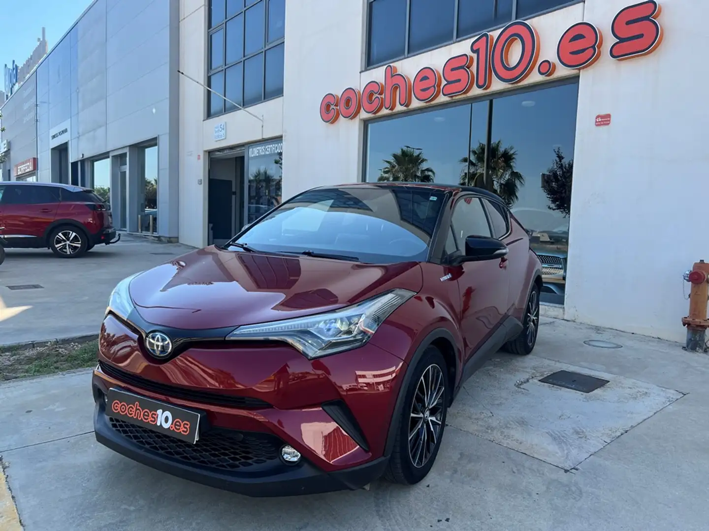 Toyota C-HR 125H Dynamic Plus Burdeos - 1