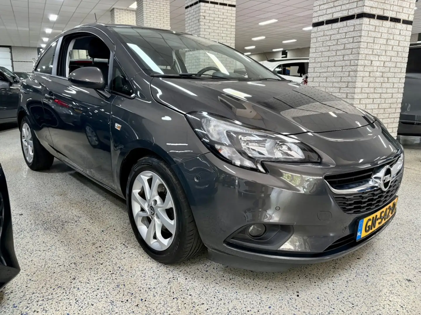 Opel Corsa 1.0 Turbo Airco DAB+ BLUETOOTH PDC v+a AUX Gris - 2