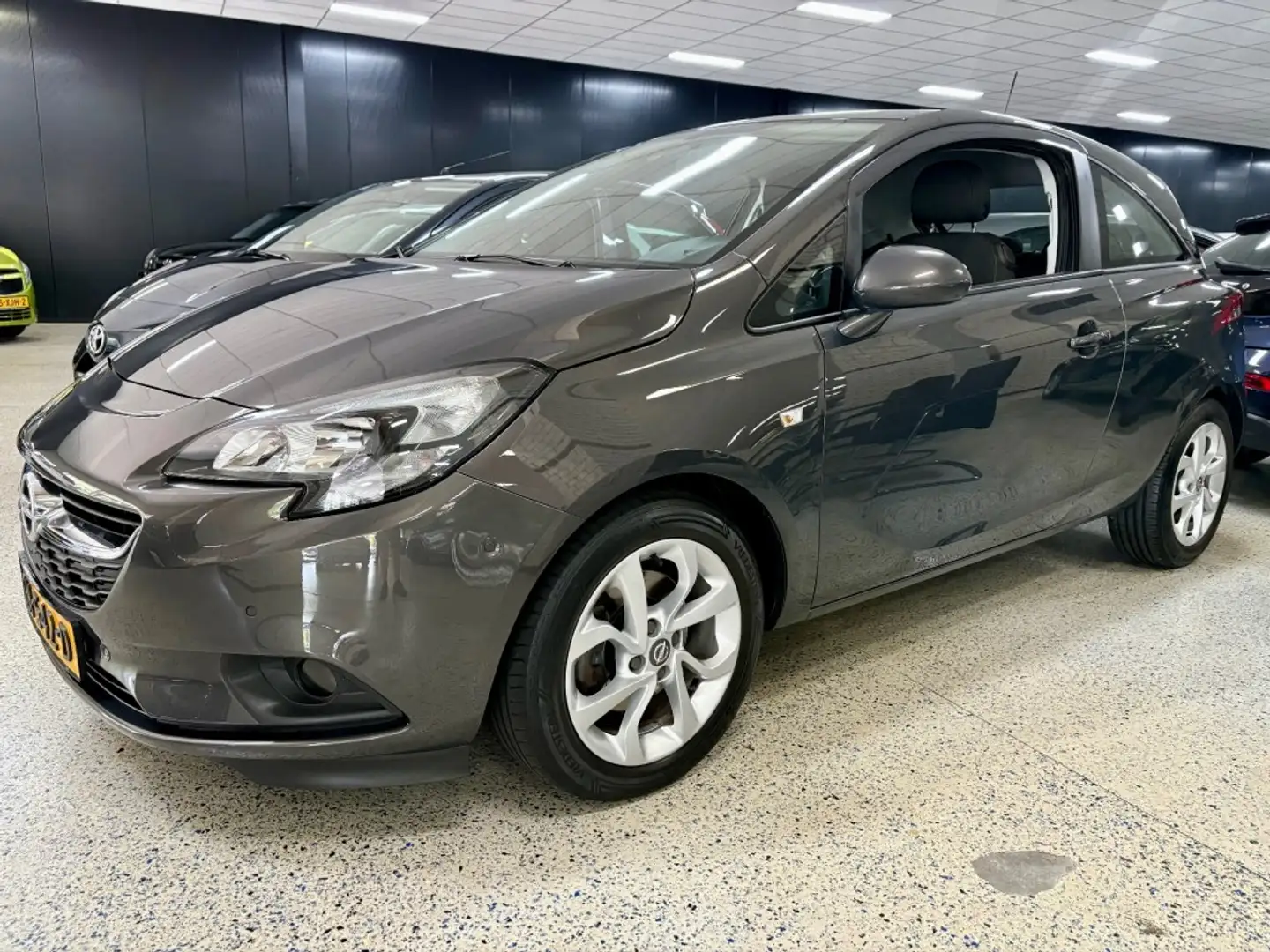Opel Corsa 1.0 Turbo Airco DAB+ BLUETOOTH PDC v+a AUX Gris - 1