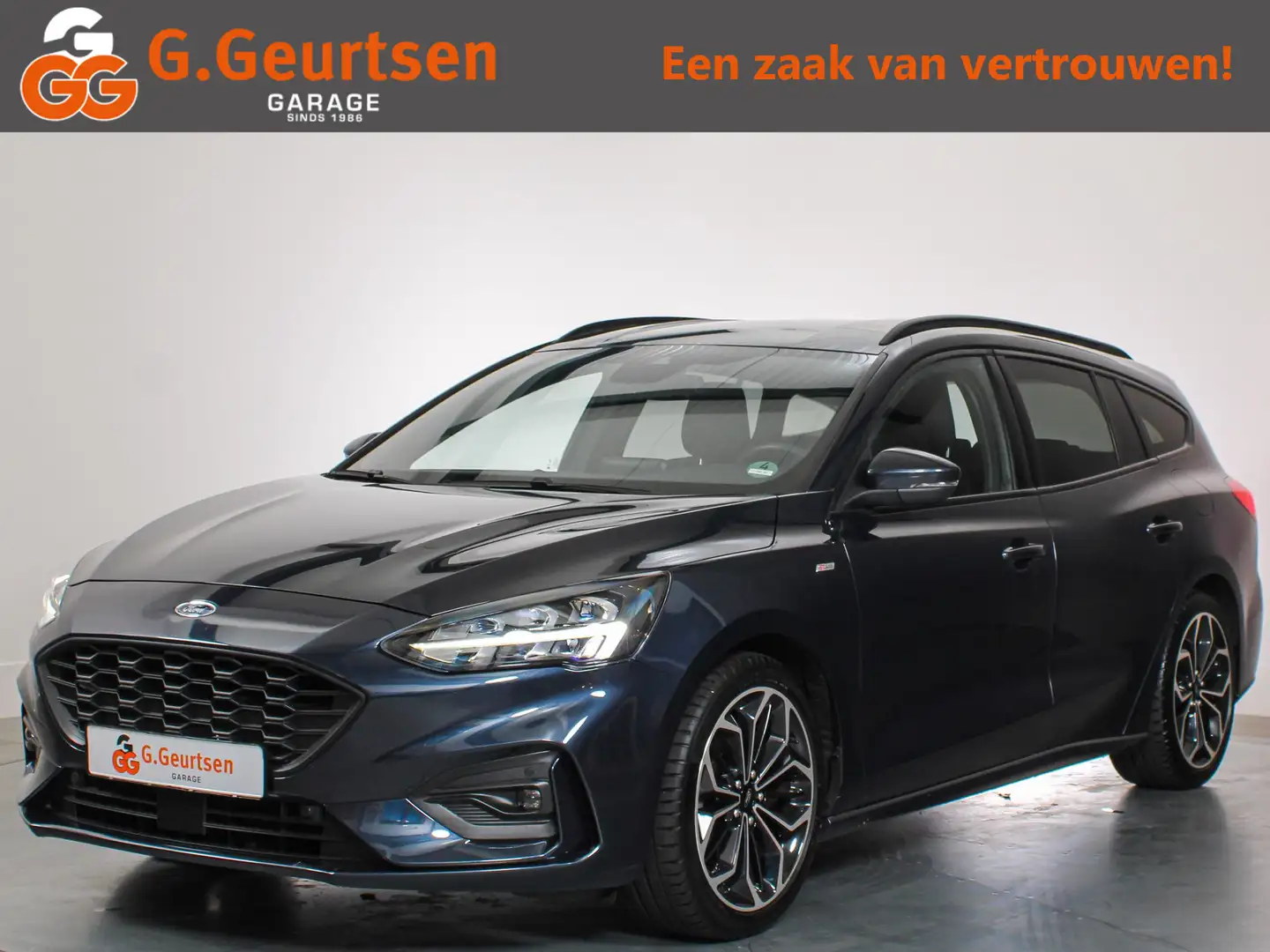 Ford Focus Wagon 1.0 EcoBoost ST-Line Business Navigatie, App Blauw - 1