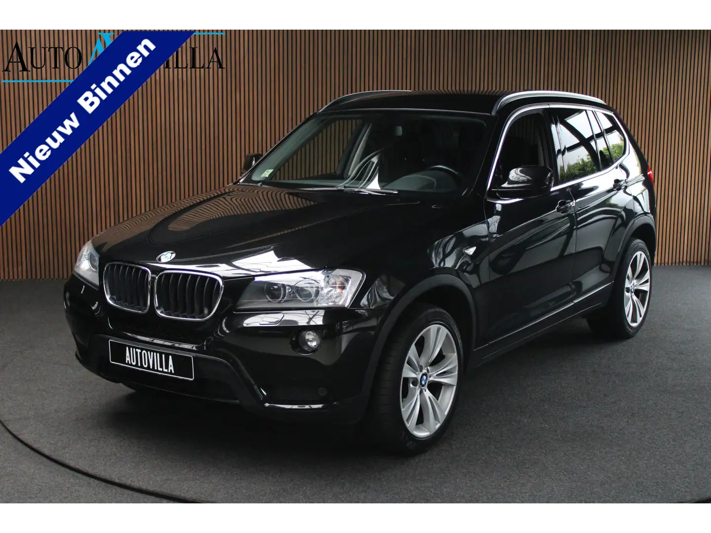 BMW X3 sDrive18d Aut. Navi Climate C. Bi-Xenon PDC LM vel Zwart - 1
