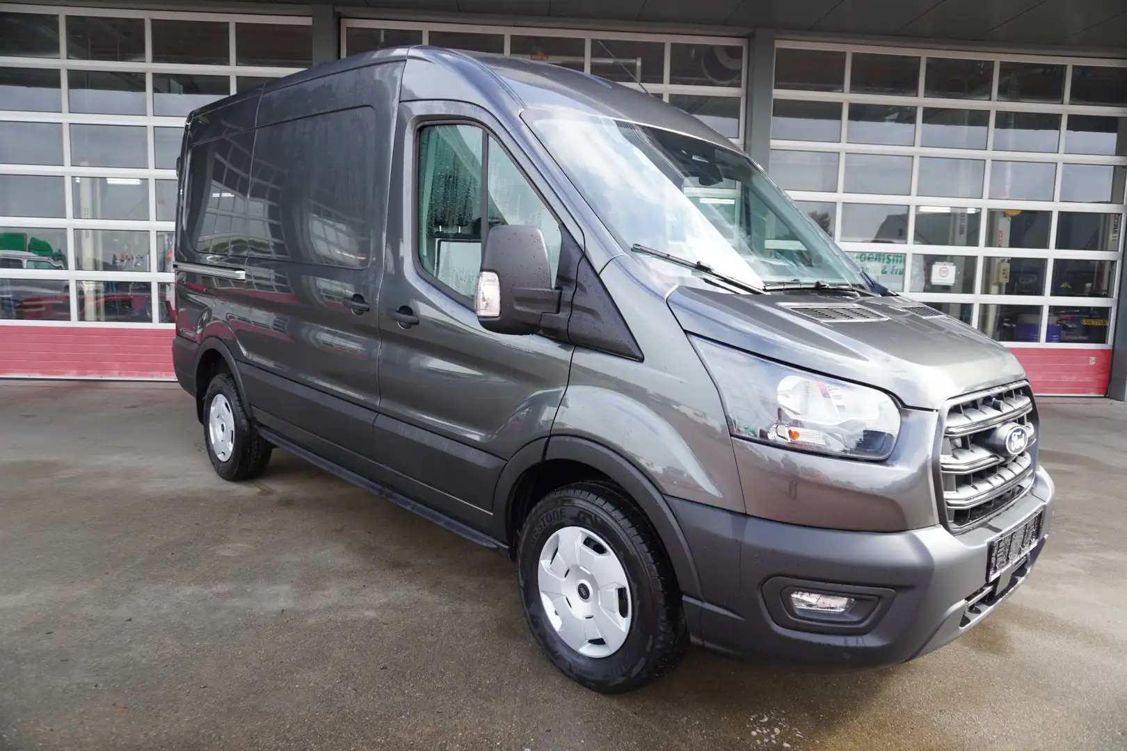 Ford Transit 350 2.0 TDCI 165pk L2H2 Trend Automaat Schuifdeur Grijs - 1