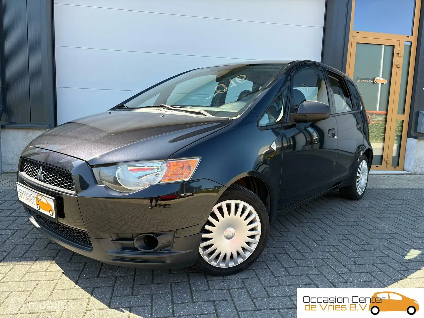Mitsubishi Colt 1.3 5-deurs Airco ElektrischPakket Bluetooth Nero - 1