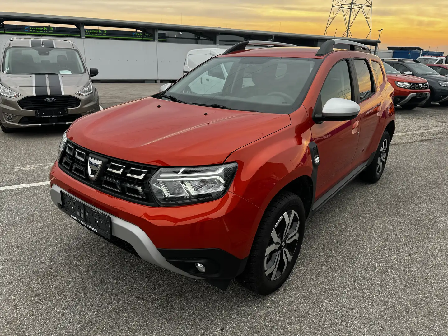 Dacia Duster TCe 90 Prestige (Navi, Kamera, Ganzjahresreifen) Orange - 1