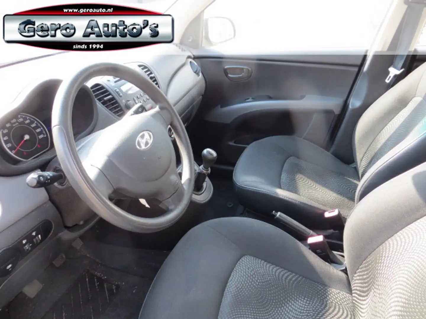 Hyundai i10 1.1 i-Drive Cool airco airco ,lmv,cv ,elec ramen n Gris - 2