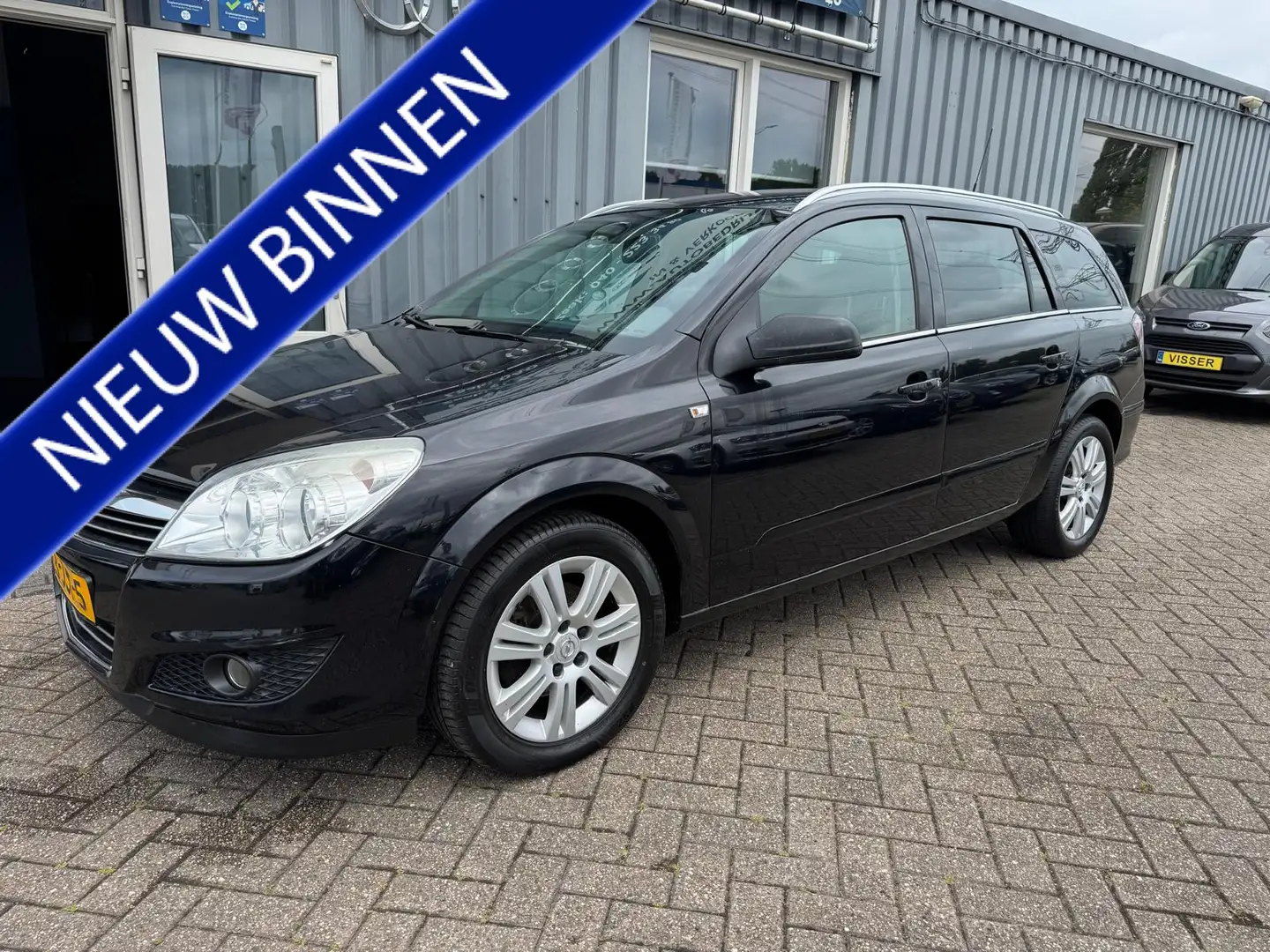 Opel Astra Wagon 1.6 Cosmo Zwart - 1