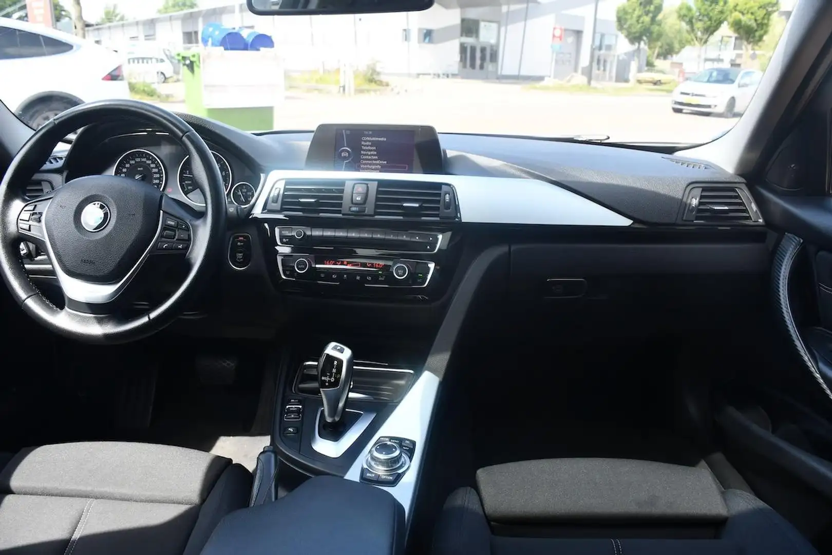 BMW 320 3-serie 320i xDrive High Executive AUT|Nav|Cruise| Blauw - 2