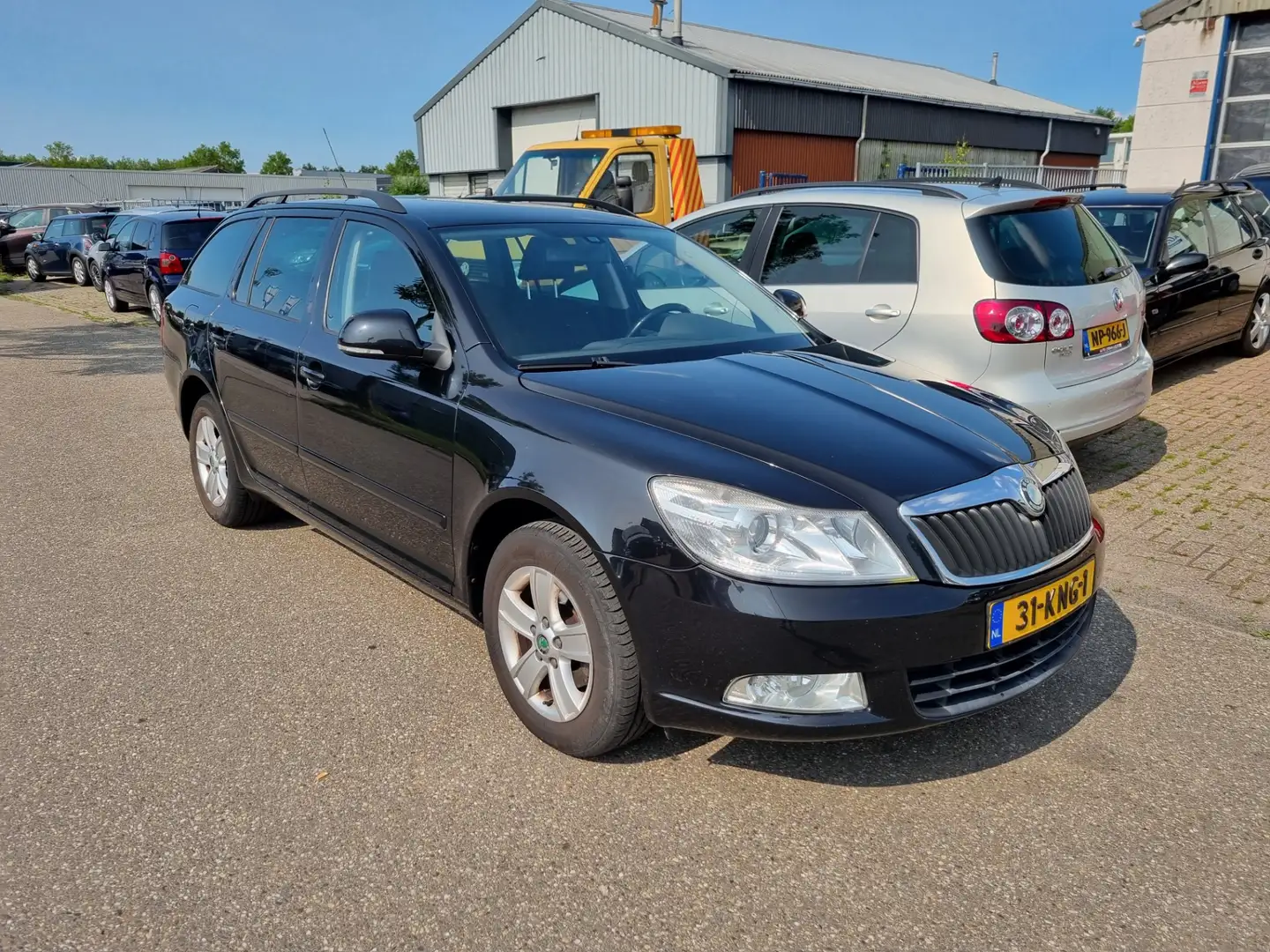 Skoda Octavia Combi 1.4 TSI Ambition Business Line Clima Bj:2010 Zwart - 2