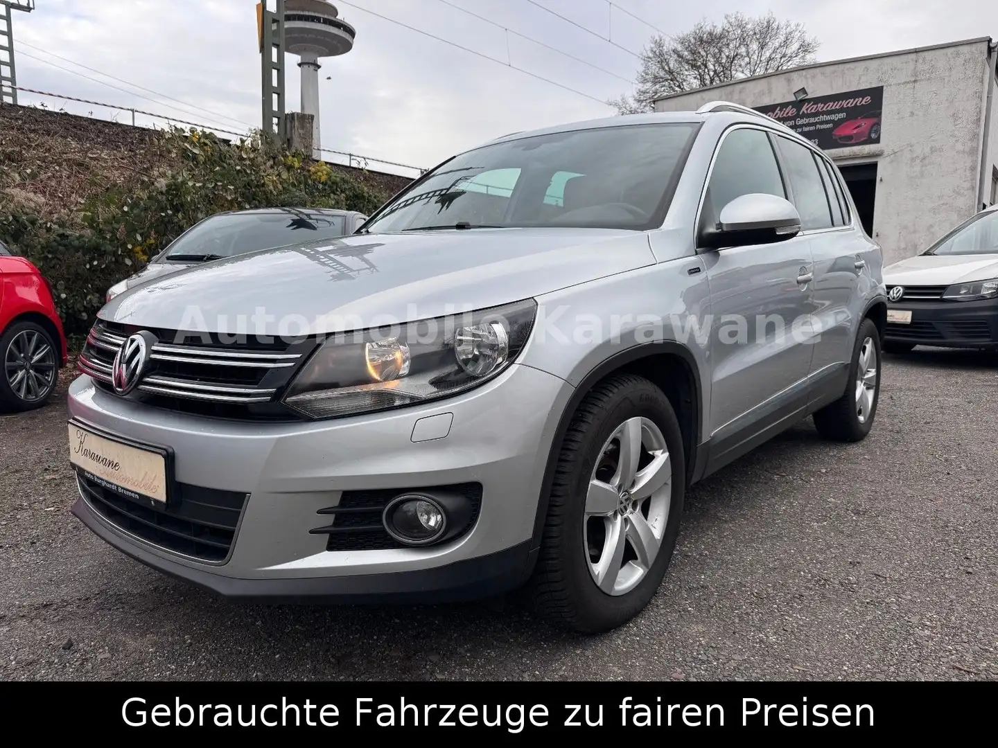 Volkswagen Tiguan Lounge Sport & Style BMT*Navi*R-CAM*2.HD* Zilver - 1