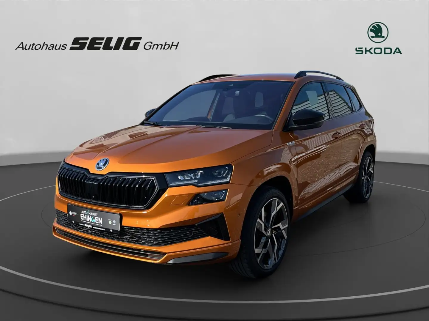 Skoda Karoq 2.0 TSI 4x4 DSG Sportline, Navi, AHK, Cant Orange - 1