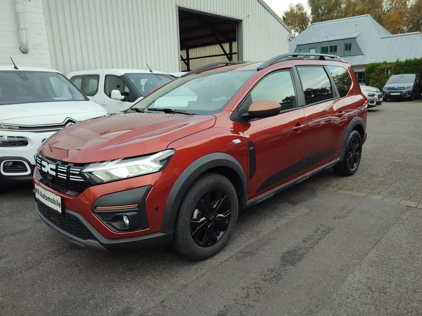 Dacia Jogger Hybrid 140 Extreme+7-Sitze/Automatik/Navi Brun - 1