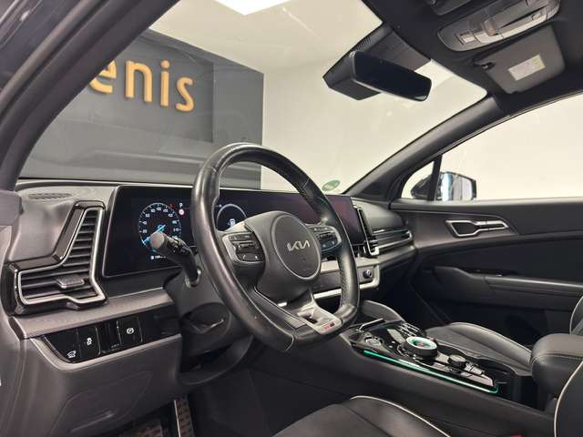 Kia Sportage — photo 14