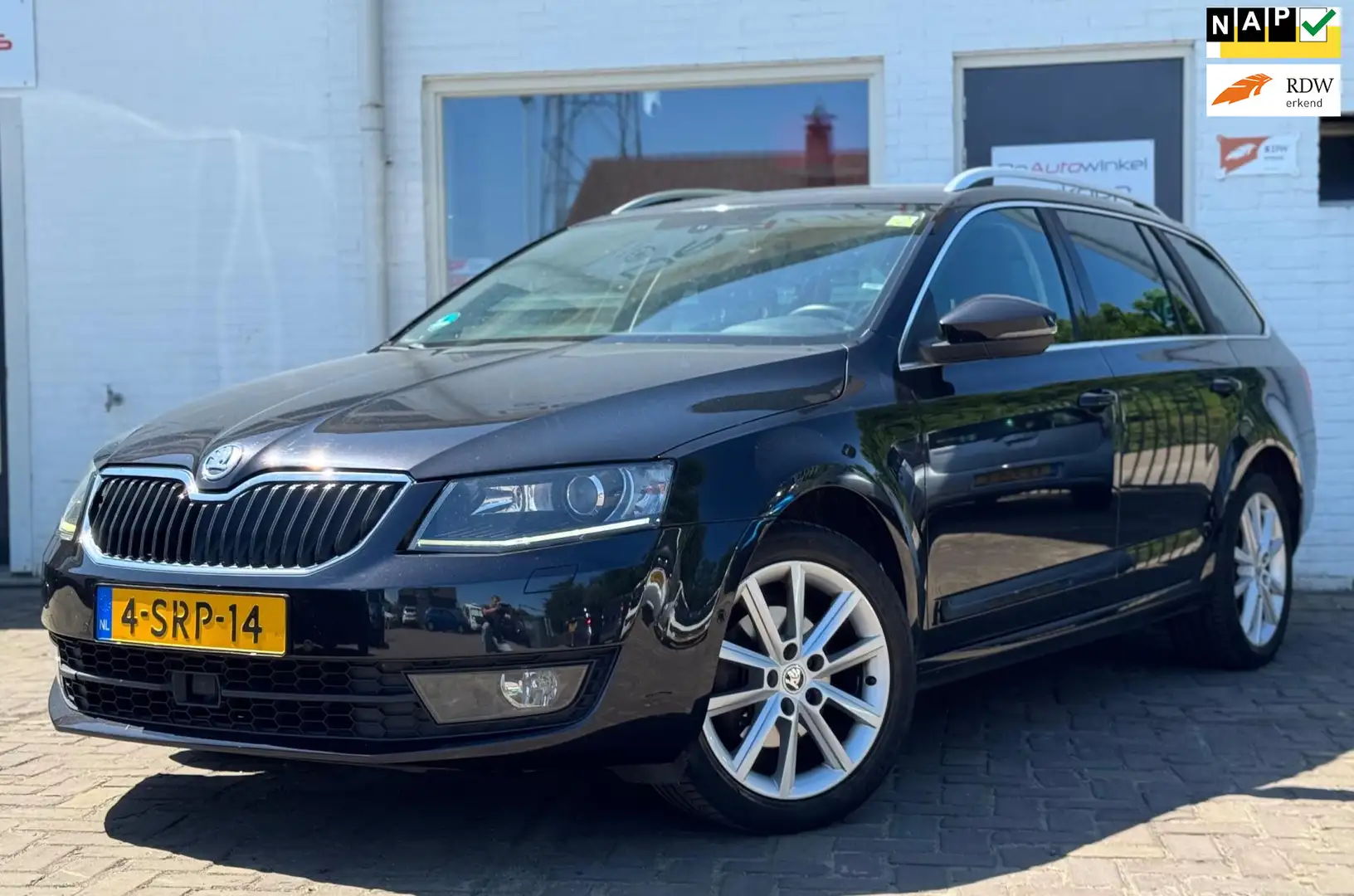 Skoda Octavia Combi 1.4 TSI Trekhaak Elegance Businessline Noir - 1