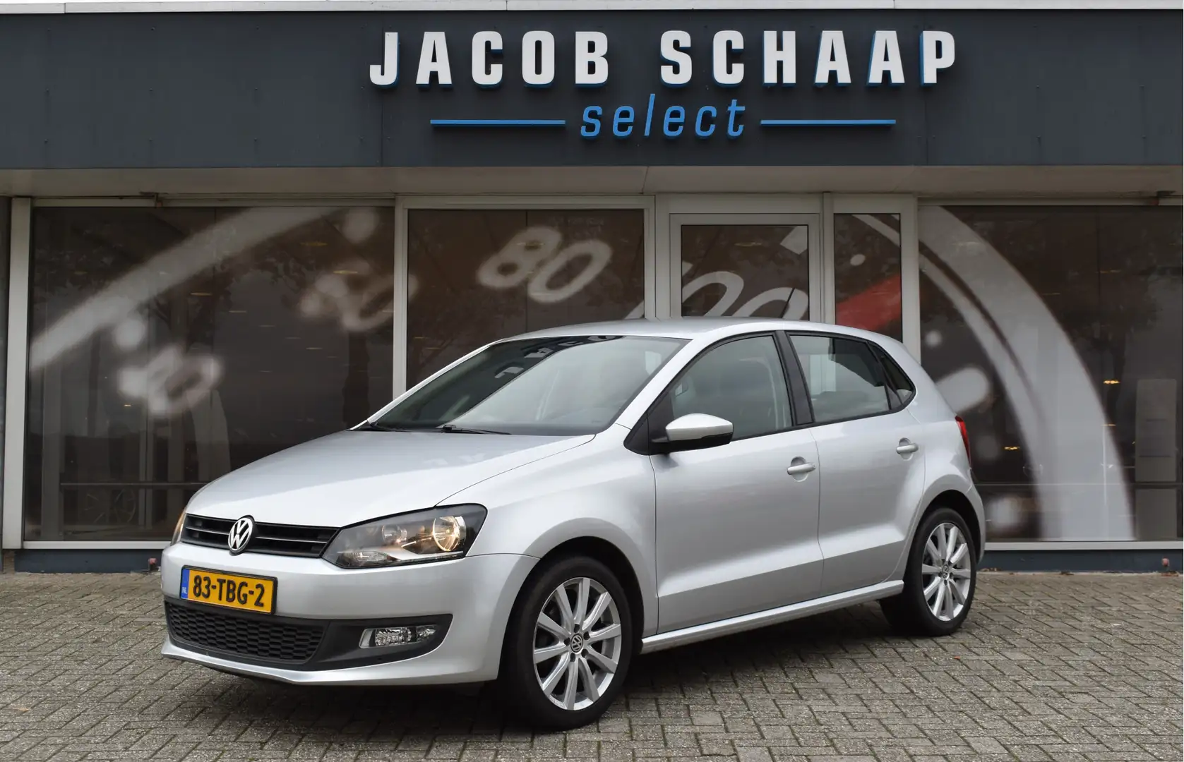 Volkswagen Polo 1.2 TSI Comfortline 5-drs / Navi / Trekhaak / Meen Grijs - 1