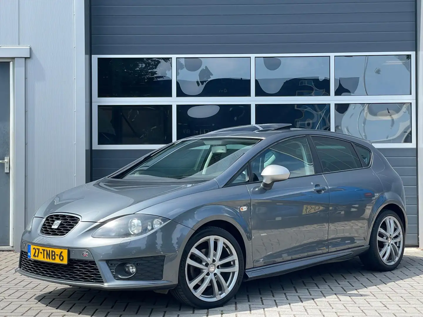 SEAT Leon 1.8 TFSI 161pk FR | DSG | Xenon | Schuifdak | Navi Gris - 1