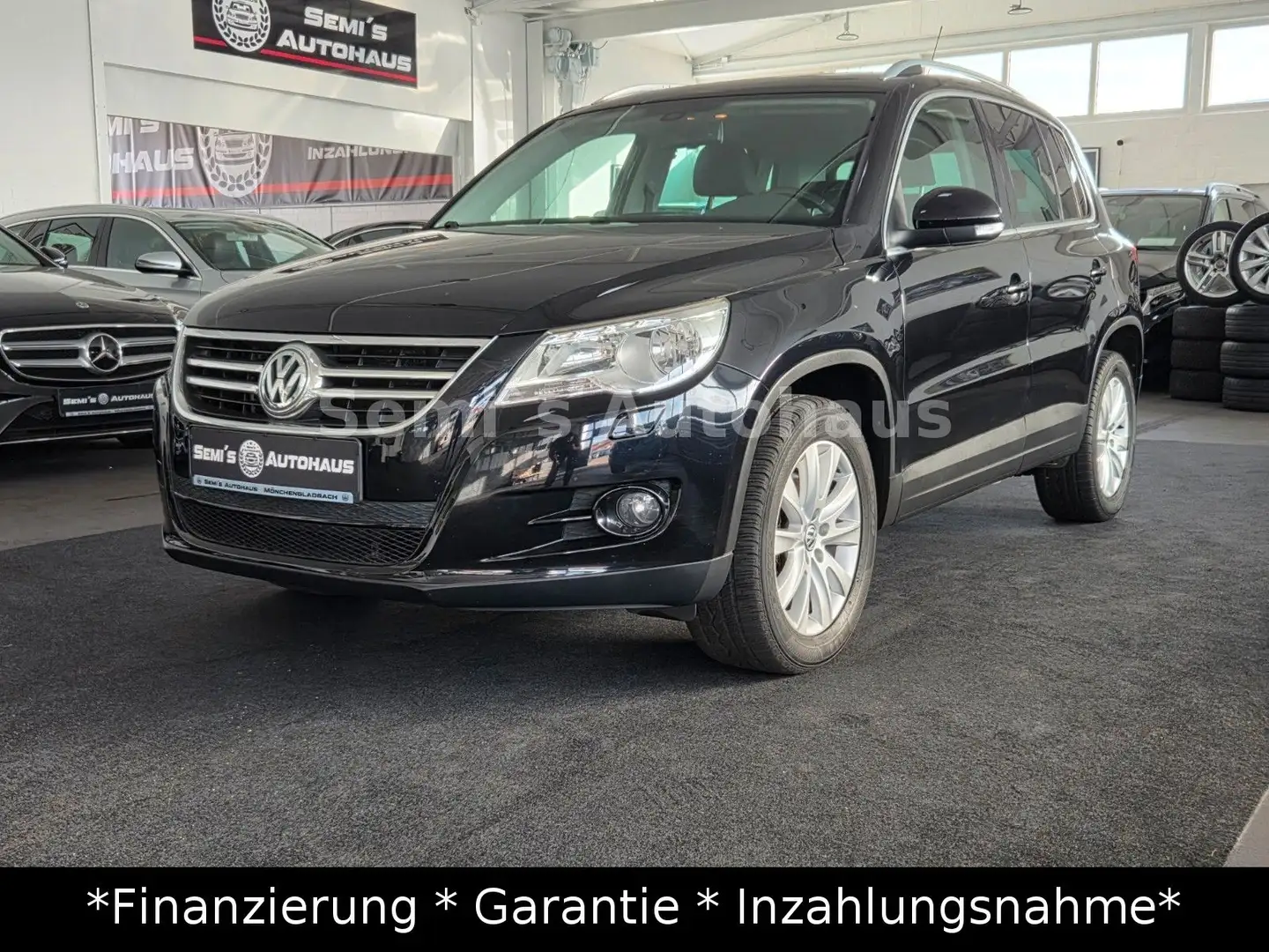 Volkswagen Tiguan Sport & Style 4Motion*2.Hand*Panorama* Schwarz - 1