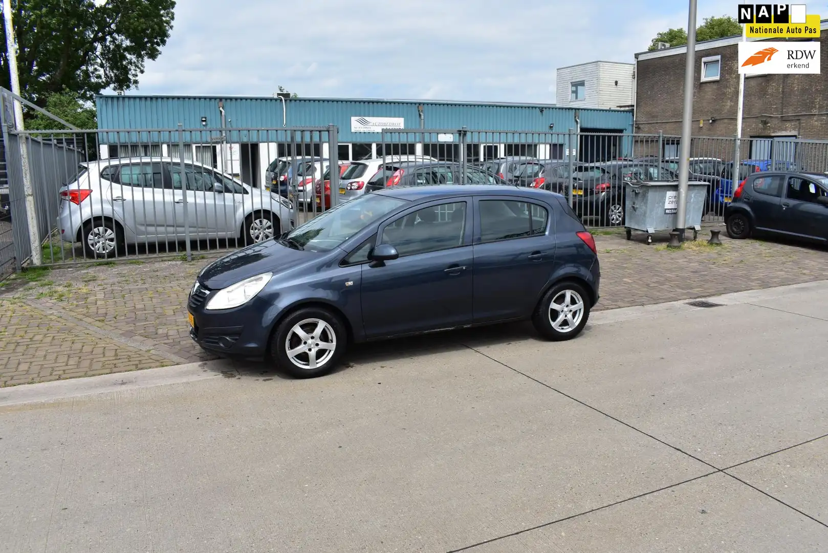 Opel Corsa 1.2-16V Enjoy Grijs - 1