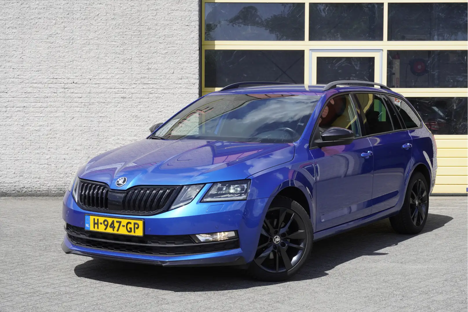 Skoda Octavia Combi 1.0 TSI Sport Business BJ2020 Lmv 17" | Led Blauw - 1