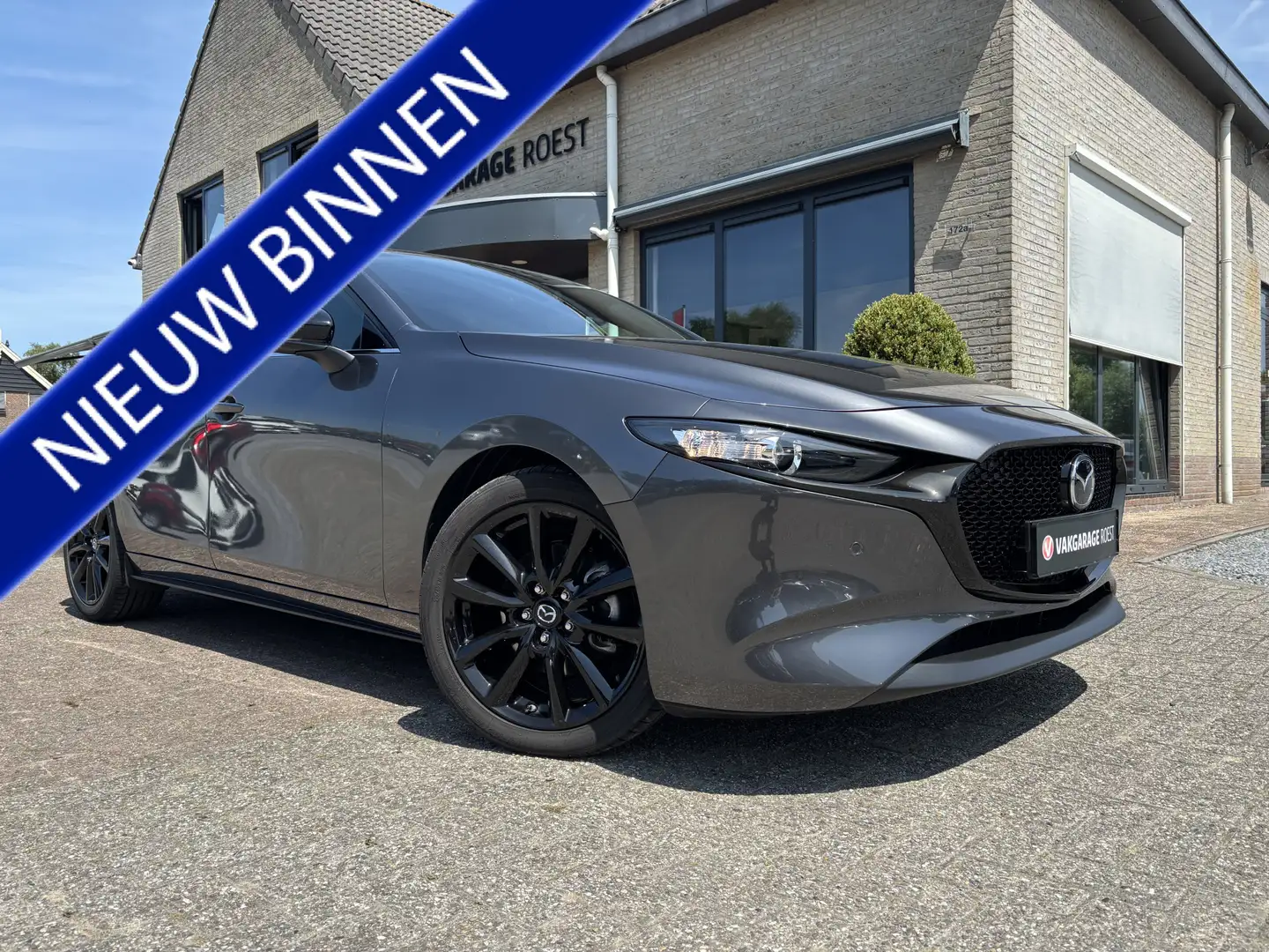 Mazda 3 2.0 e-SkyActiv-X M Hybrid 186pk Homura Carplay / K Grijs - 1