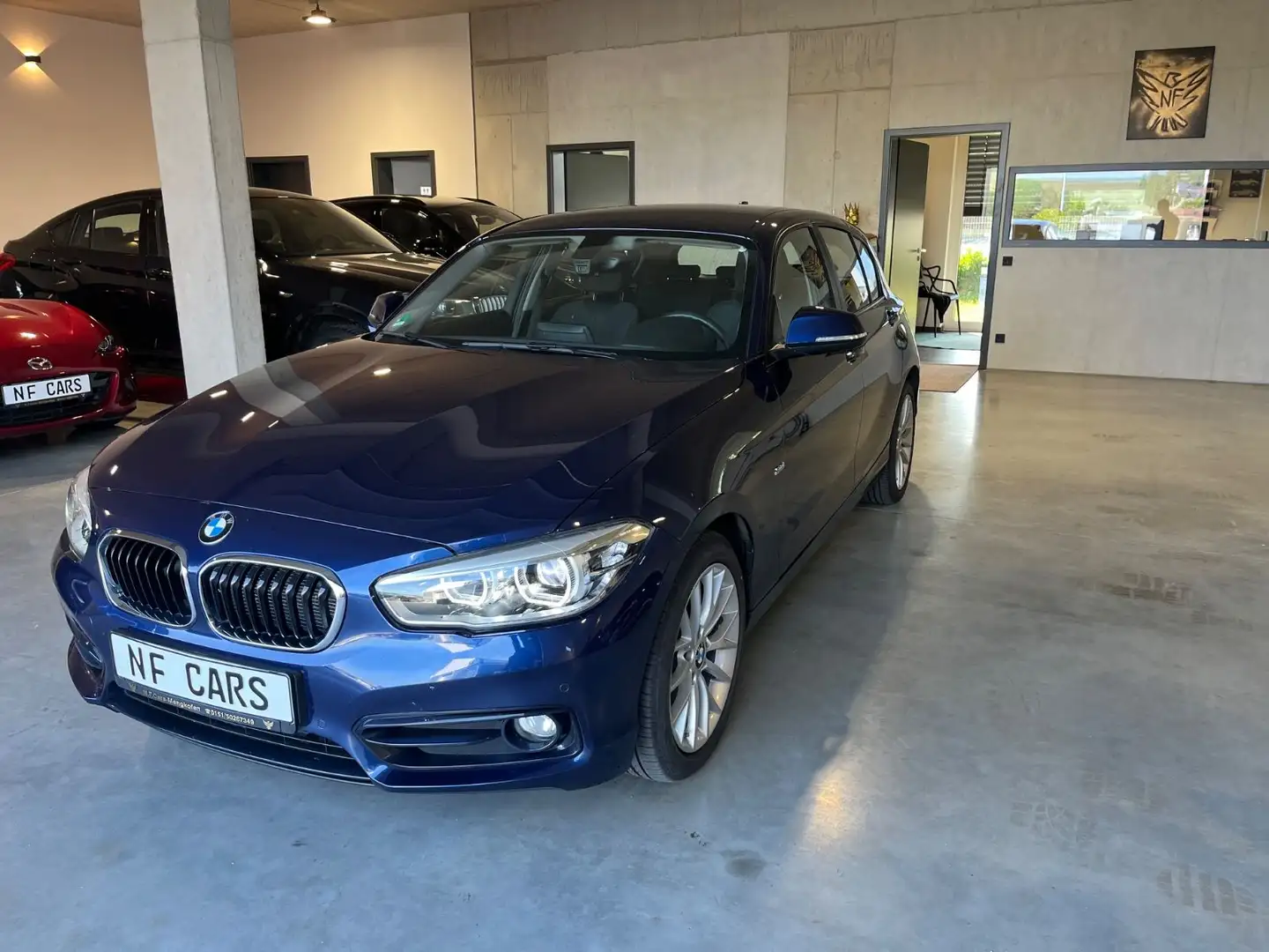 BMW 118 i Sport Line 5-trg.  Limo,LED,Navi,EURO6,1Hd Bleu - 1