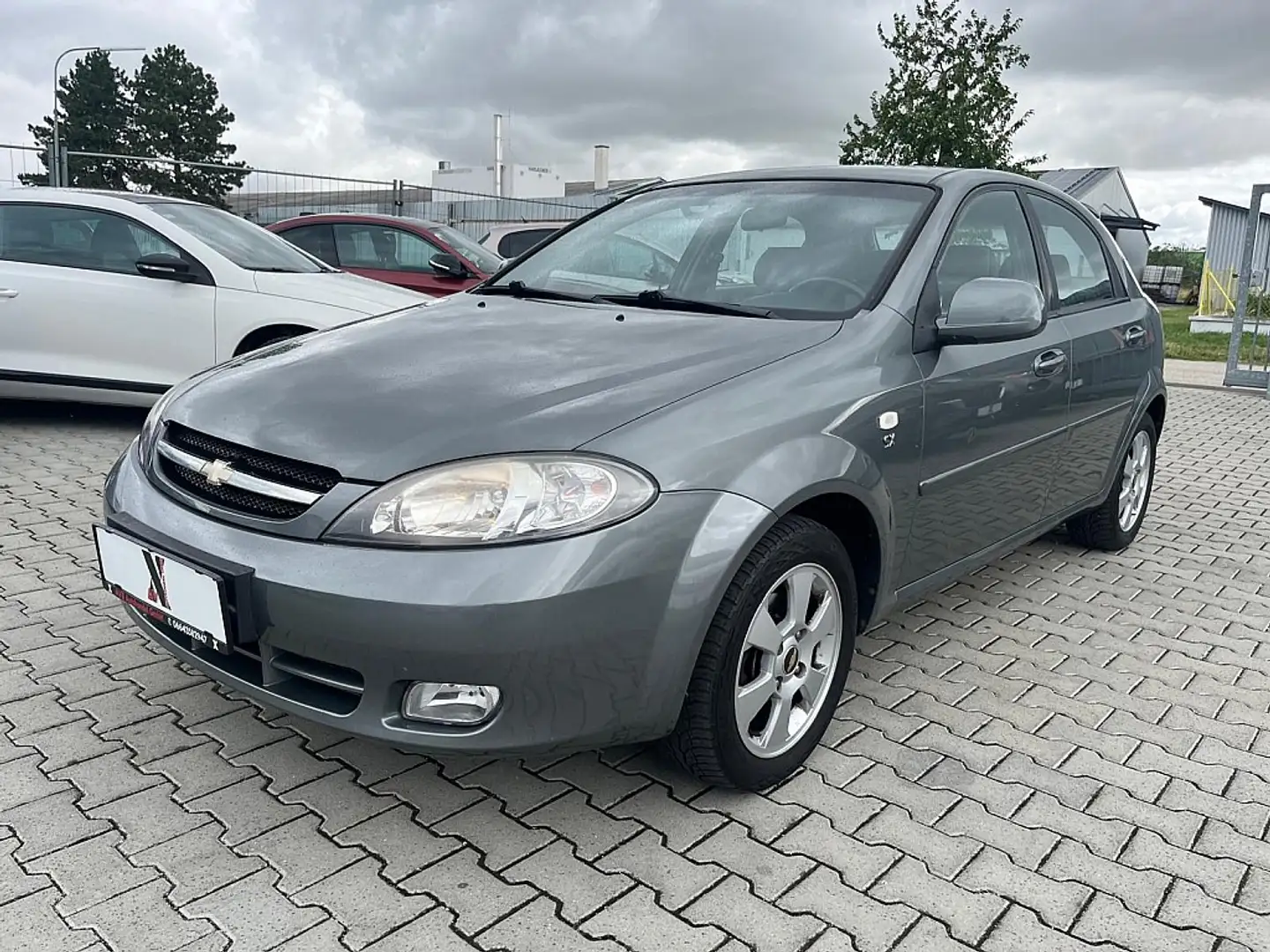 Chevrolet Lacetti 1,6 SX/ERSTBESITZ/PICKERL 09/2025/ Gris - 1