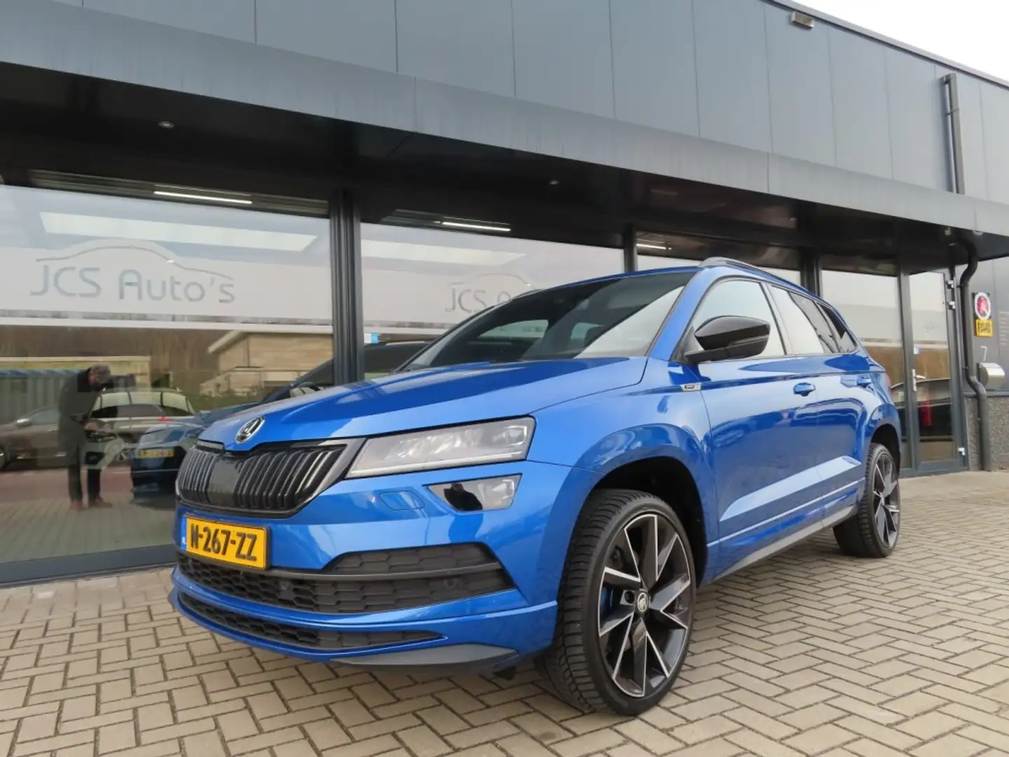 Skoda Karoq 1.5 TSI Sportline Business Led Pano Trekhaak 2022 Blau - 1