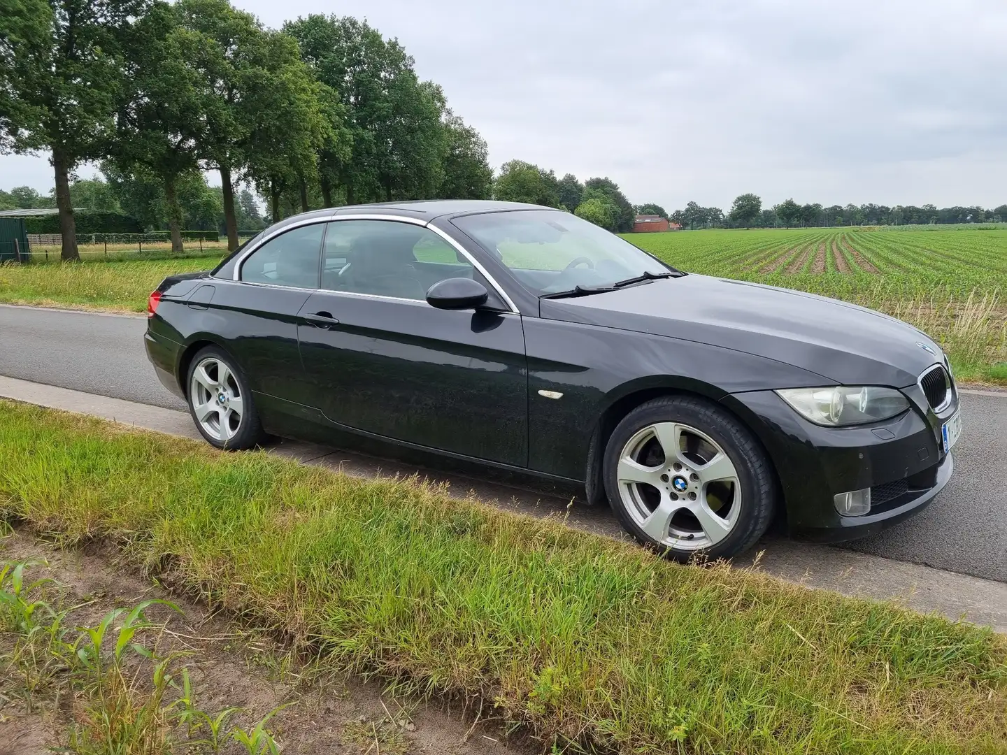 BMW 320 3 CABRIOLET - 2007 automaat Zwart - 2