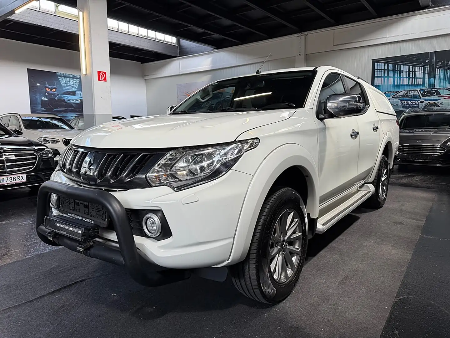 Mitsubishi L200 L 200 2,4 DI-D HP 4WD Doppelkabine Intense Aut. Schwarz - 1