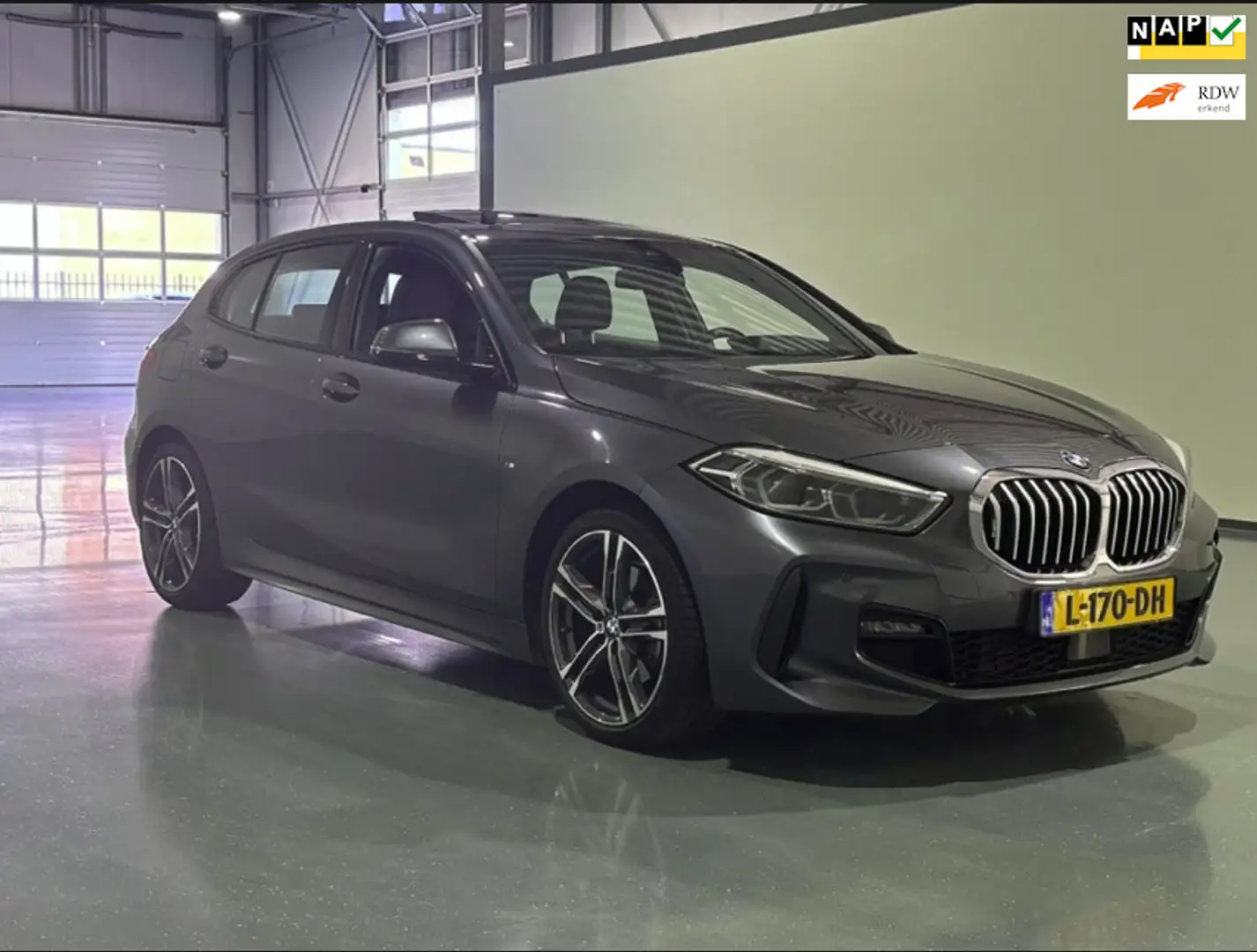 BMW 118 1-serie 118i HIGH EXECUTIVE M SPORT PANORAMADAK VI Grigio - 1