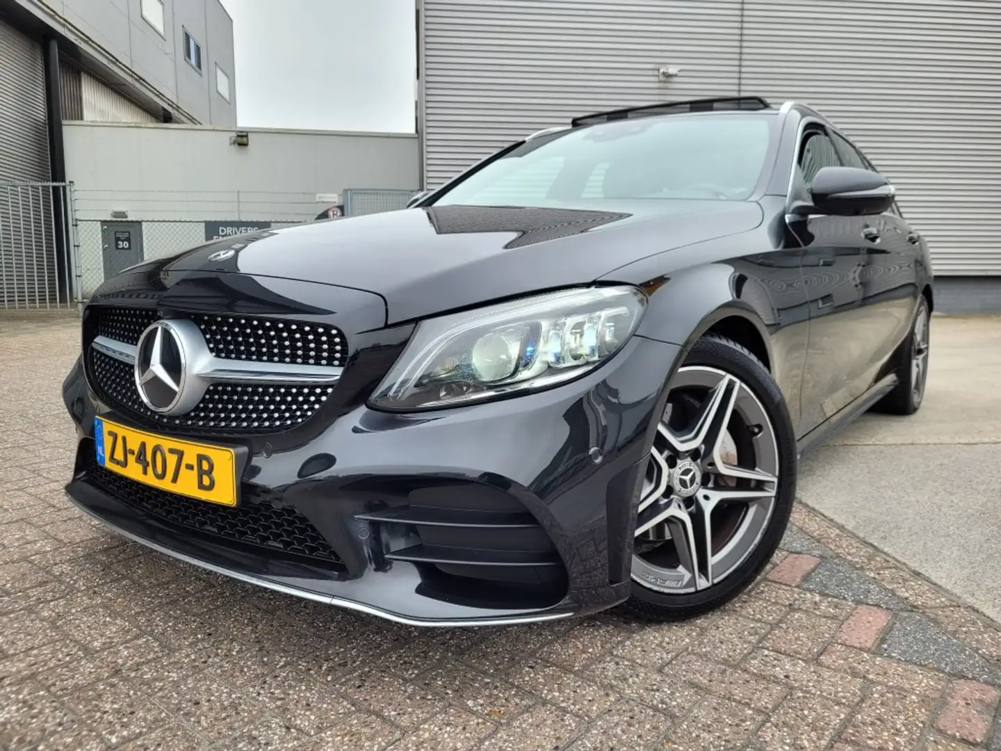 Mercedes-Benz C 200 Estate Business Solution AMG Plus Upgrade Edition Zwart - 1