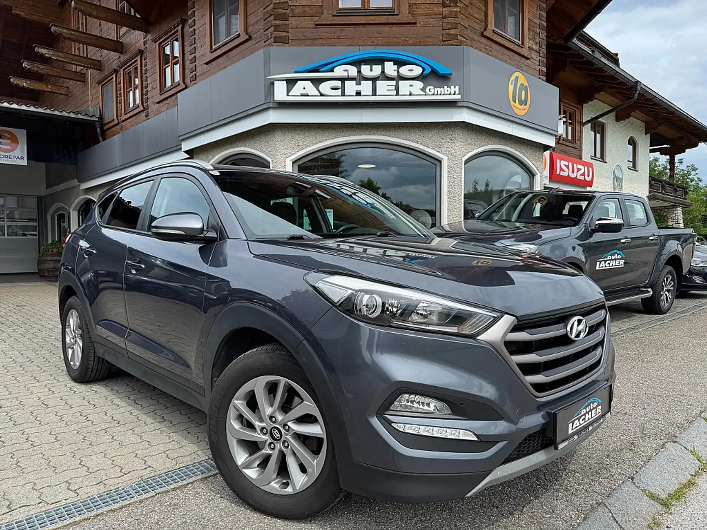Hyundai TUCSON Tucson 2,0 CRDI 4WD Style Grau - 1
