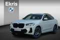 BMW X4 xDrive20i High Executive M Sport / Trekhaak  / Hea Wit - thumbnail 1