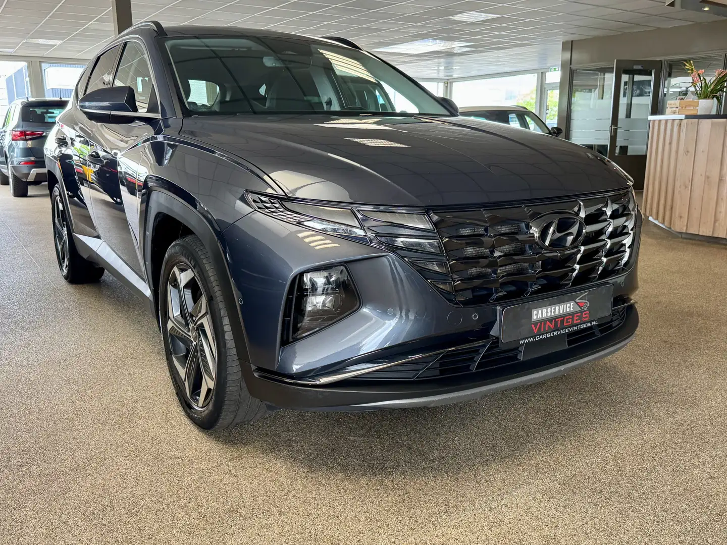 Hyundai TUCSON 1.6 T-GDI PHEV Premium 4WD 360cam, Leder, Stoelver Grijs - 2