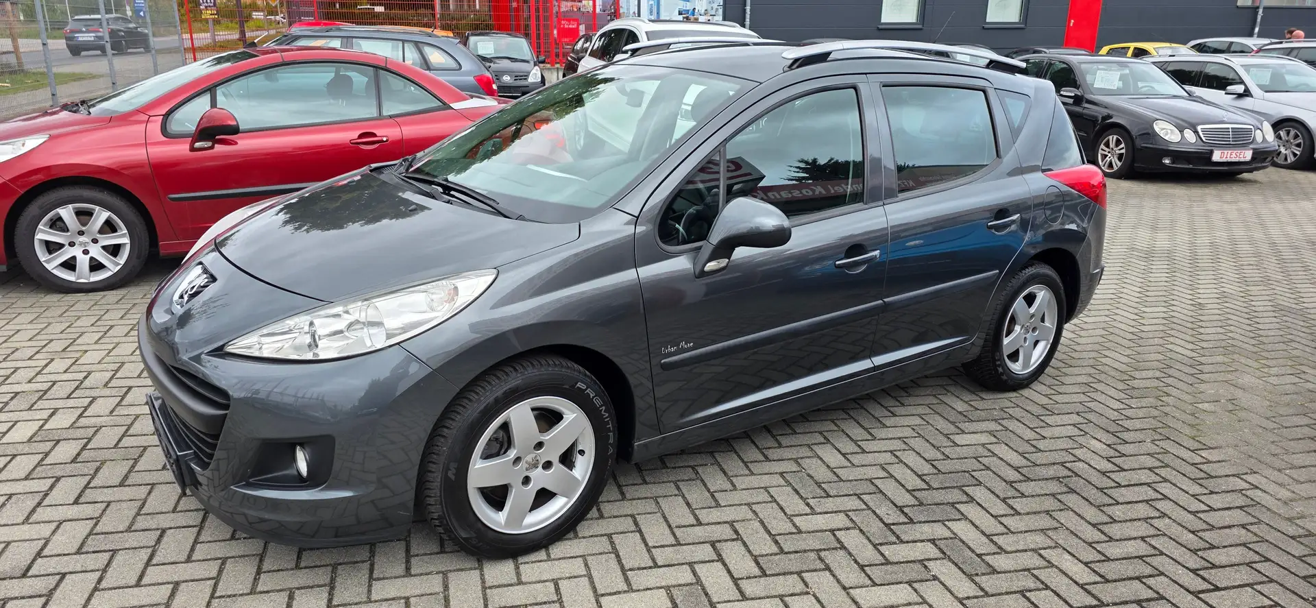 Peugeot 207 207 SW 95 VTi 1.Hand!119tkm*Panorama Grau - 1