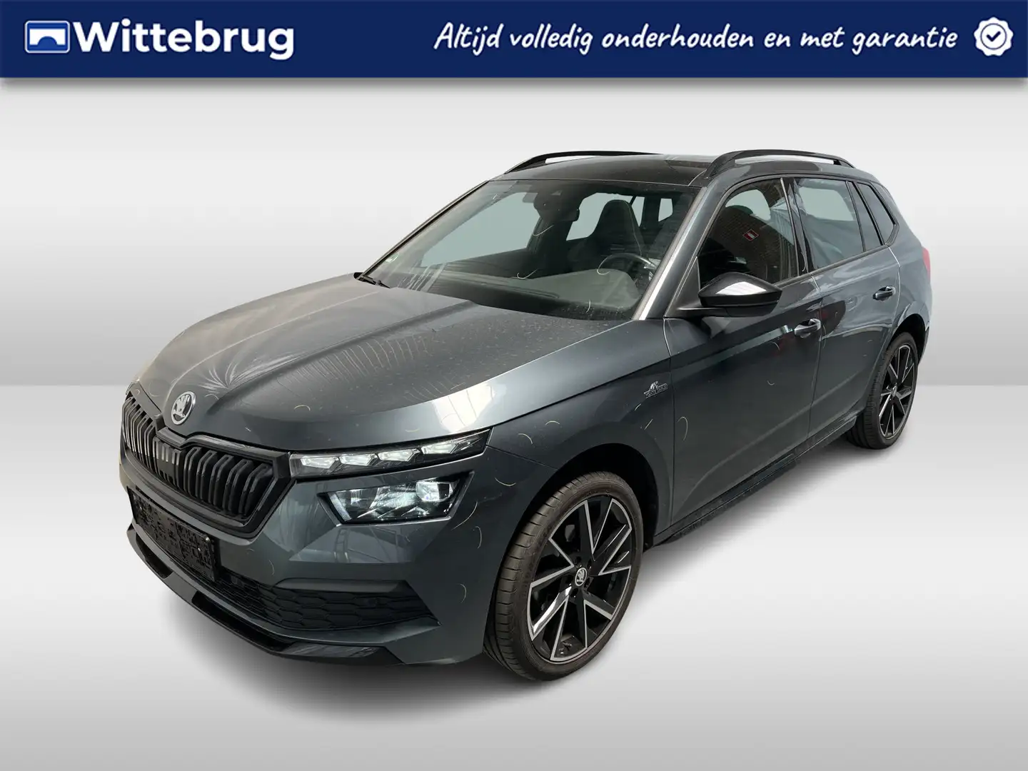 Skoda Kamiq 1.0 TSI Monte Carlo / AUTOMAAT/ PANO/ TREKHAAK/ PA Grijs - 1