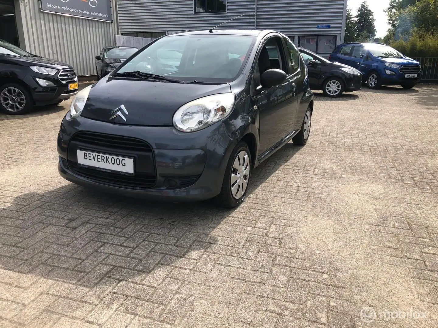 Citroen C1 1.0-12V Ambiance 6/12 m Garantie Grau - 1